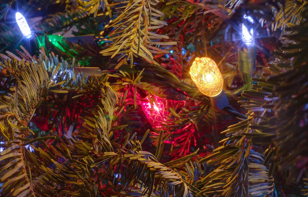 Close-up of lights on an artificial Christmas tree